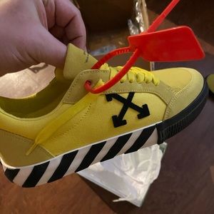 off-white sneakers, sz 41, yellow  with red tag and black emblem. price $371.24